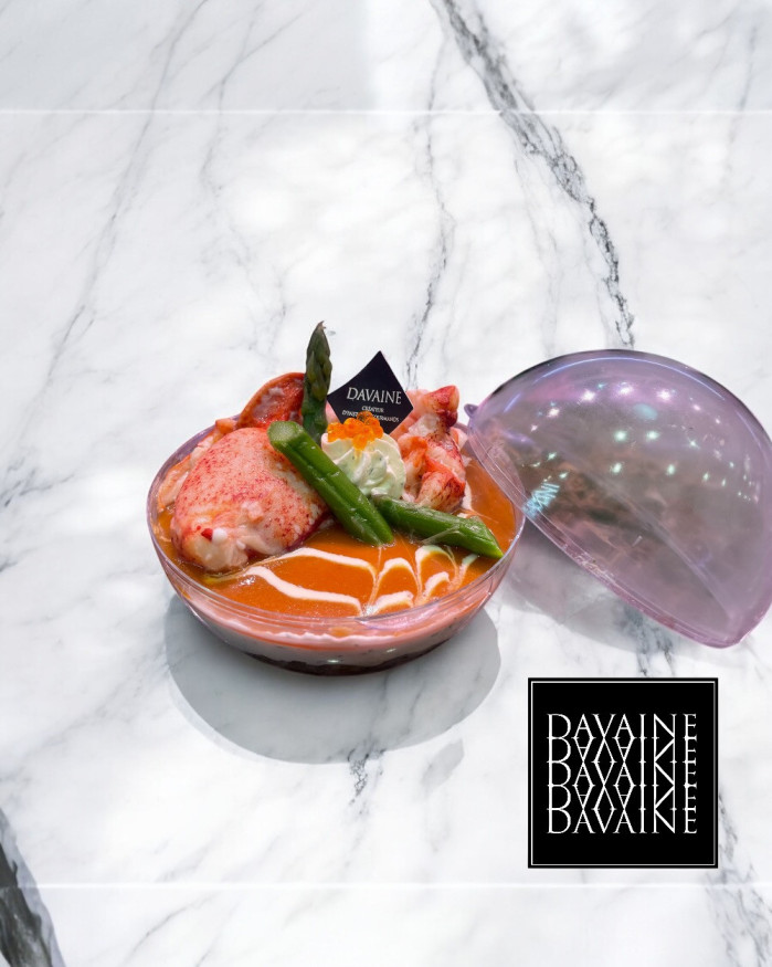 Entremet de homard, asperges vertes et petits légumes 