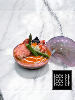 Entremet de homard, asperges vertes et petits légumes 